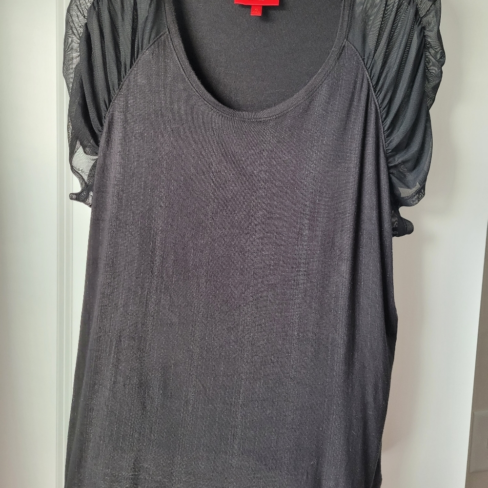 Jennifer Lopez shimmer shirt with ruched sleeves